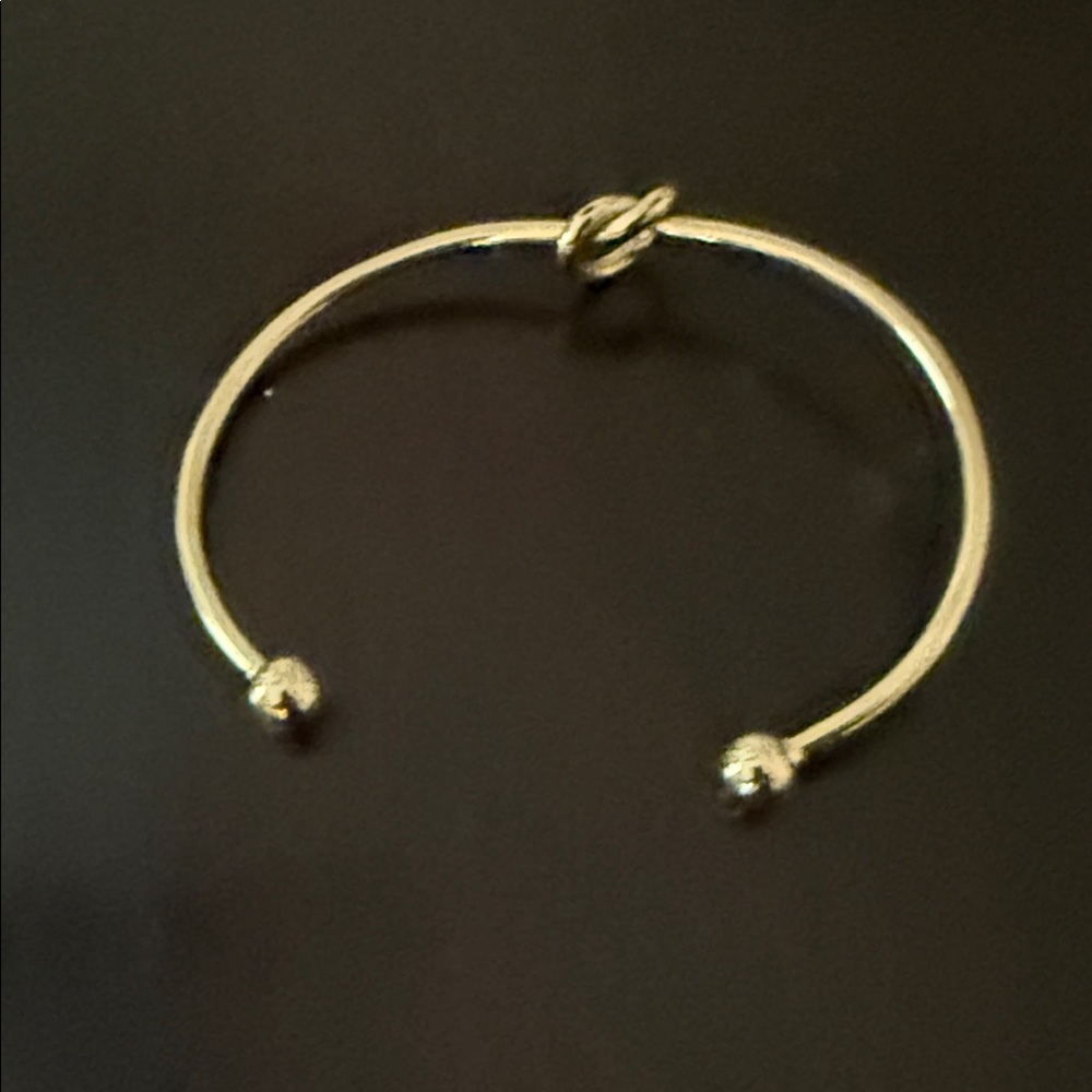 Elegant Gold Knot Cuff Bracelet - Picture 3 of 3